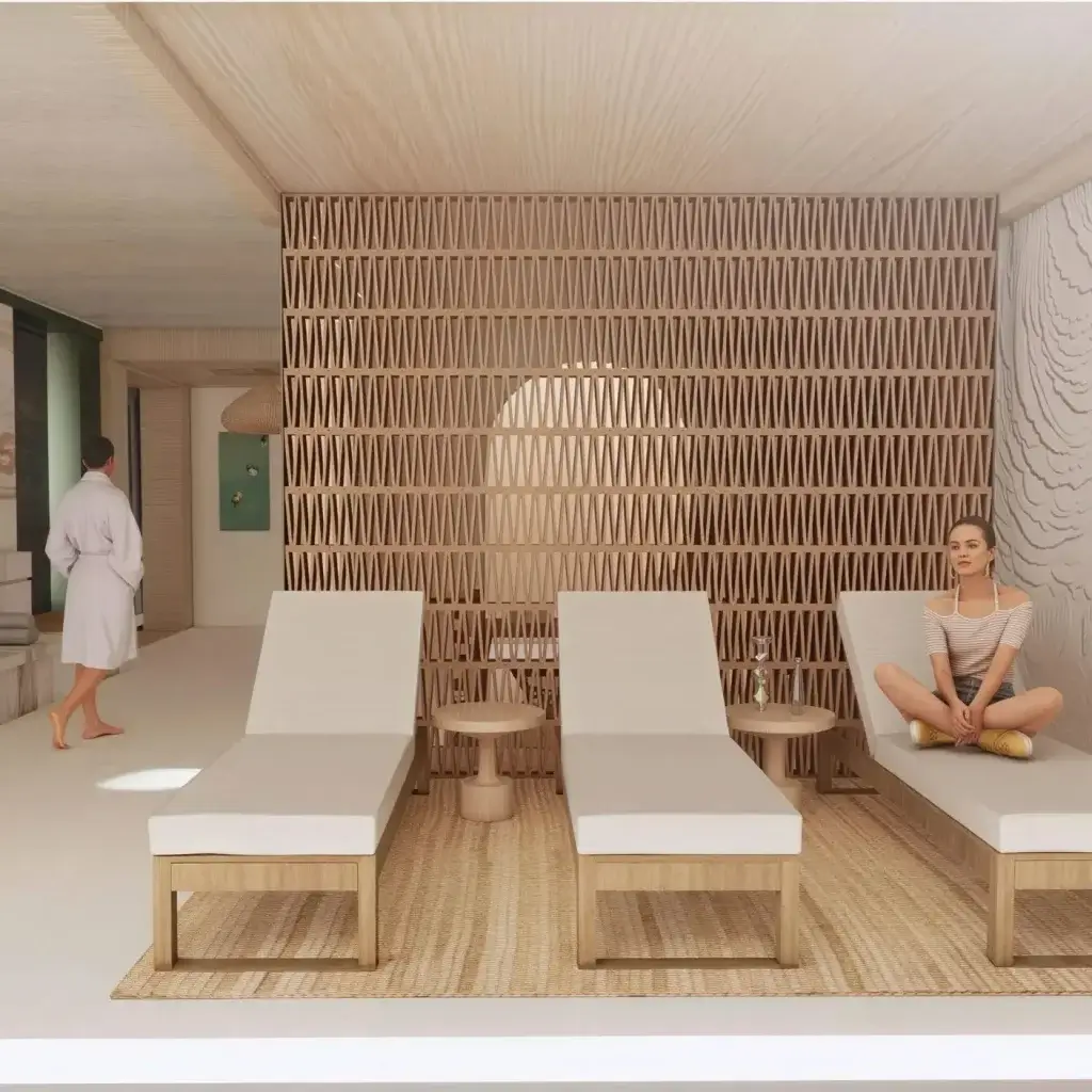 A calming, spa-inspired wellness room at Vivienne featuring a modern sauna and a tranquil lounge area for ultimate relaxation.